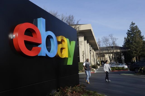 eBay cierra 2014 con pérdidas y anuncia despidos