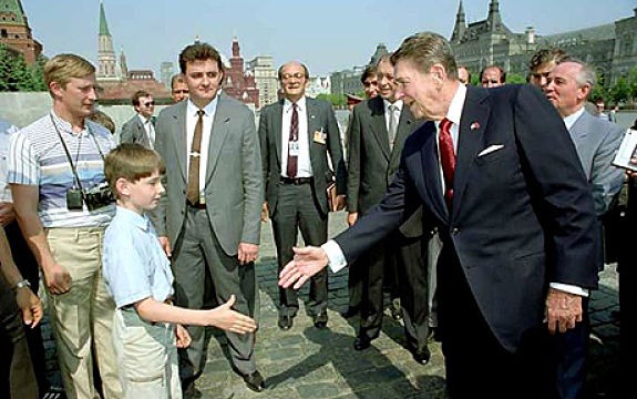 Internet image of photograph of Ronald Reagan on a trip to russia.  1st left (stripe top) is believed to be Vladimir Putin Source: pete souza / radio free europe